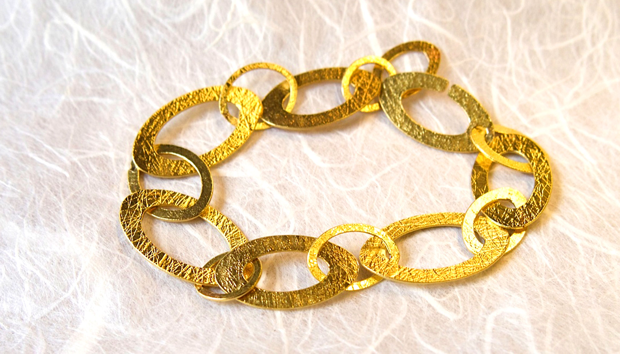 Handgearbeitetes Ösenarmband in 750/- Gold